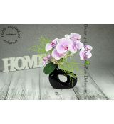 Květinové aranžmá s luxusní orchidejí v moderní černé váze Planta.