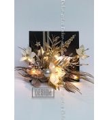 Luxusní vánoční obraz, květy zasněžených magnolií na černém plátně s LED světlem