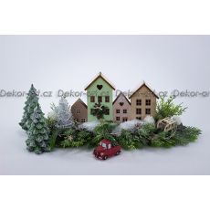 Krásné vánoční městečko se zasněženými domky a LED osvětlením