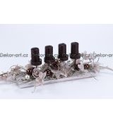 Luxusní adventní dekorace s magnolií, hvězdami a tmavě hnědými svícemi