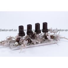 Luxusní adventní dekorace s magnolií, hvězdami a tmavě hnědými svícemi